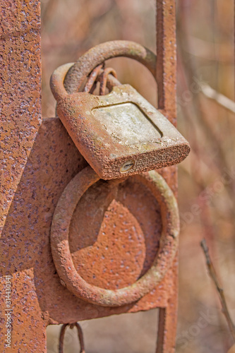Very old rusty padlock. Macro view of very old rusty padlock.