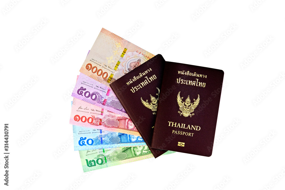 Two Thailand passports on Thai bank notes isolate on white background. Two Thailand passports on Thai bank notes isolate on white background.
