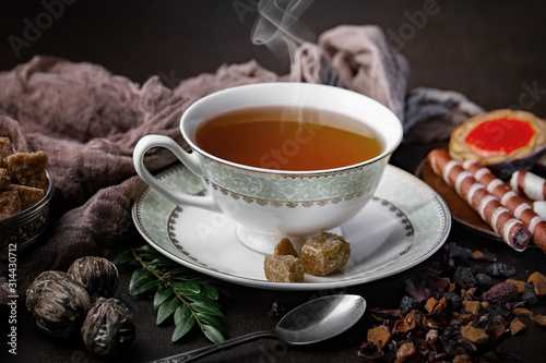 Tea in a cup on an old background