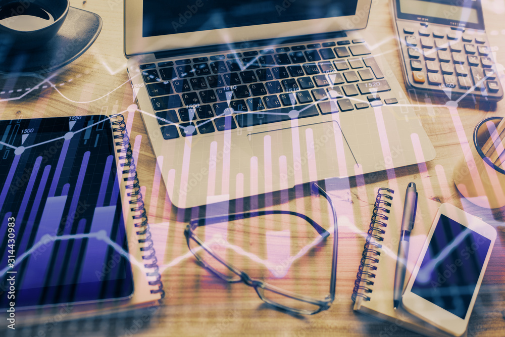 Double exposure of forex chart and work space with computer. Concept of international online trading. Double exposure of forex chart and work space with computer. Concept of international online trading.