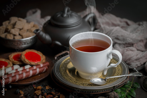 Tea in a cup on an old background