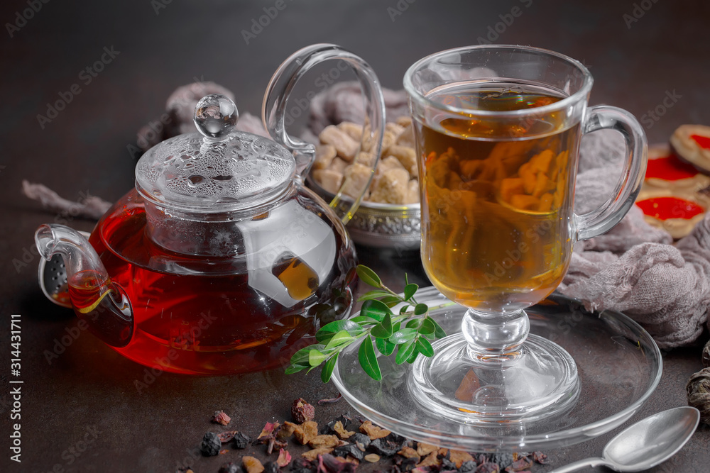 Tea hot drink on old background in composition on the table Tea hot drink on old background in composition on the table