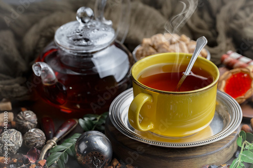 Tea in a cup on an old background