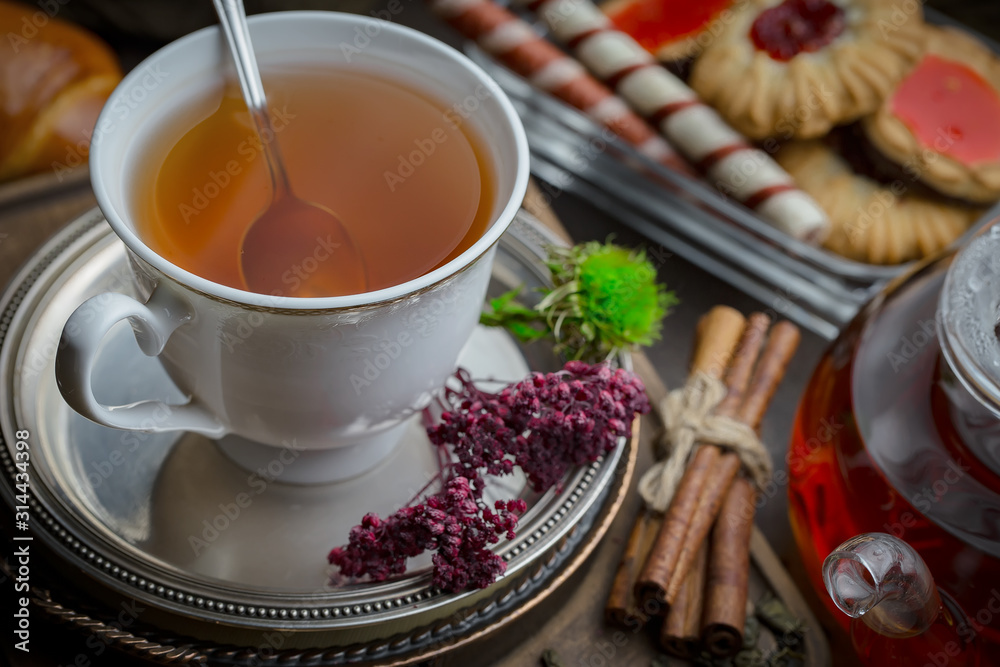Tea hot drink on old background in composition on the table Tea hot drink on old background in composition on the table