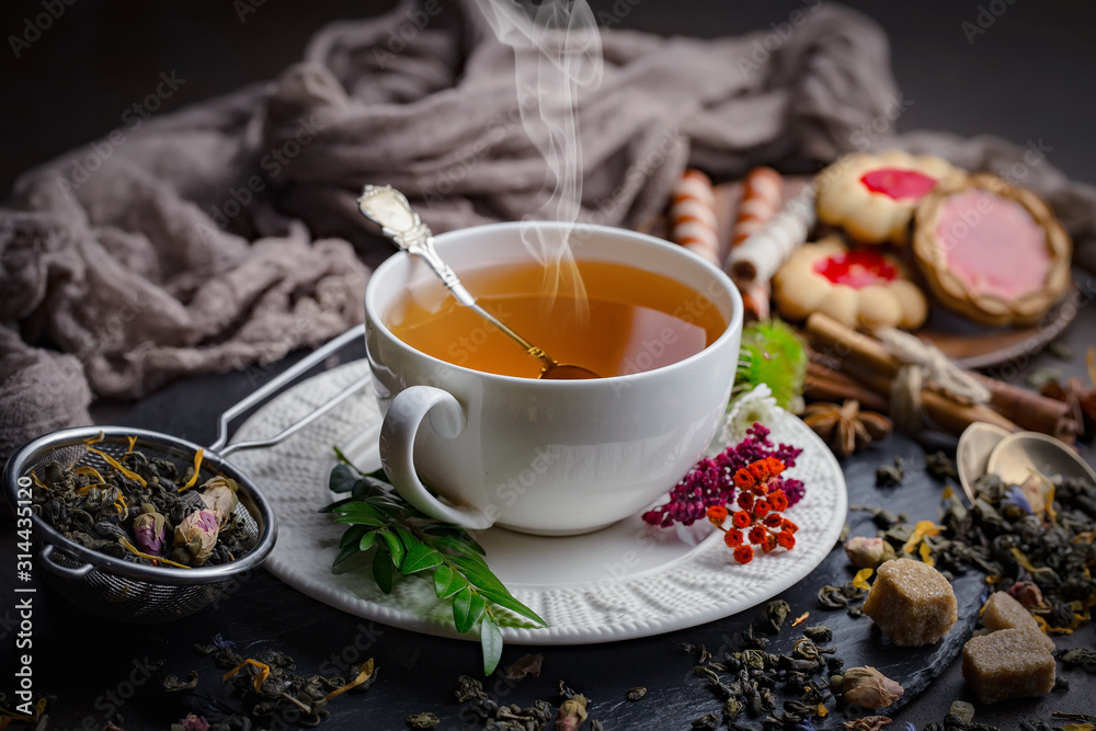 Tea in a cup on an old background Tea in a cup on an old background