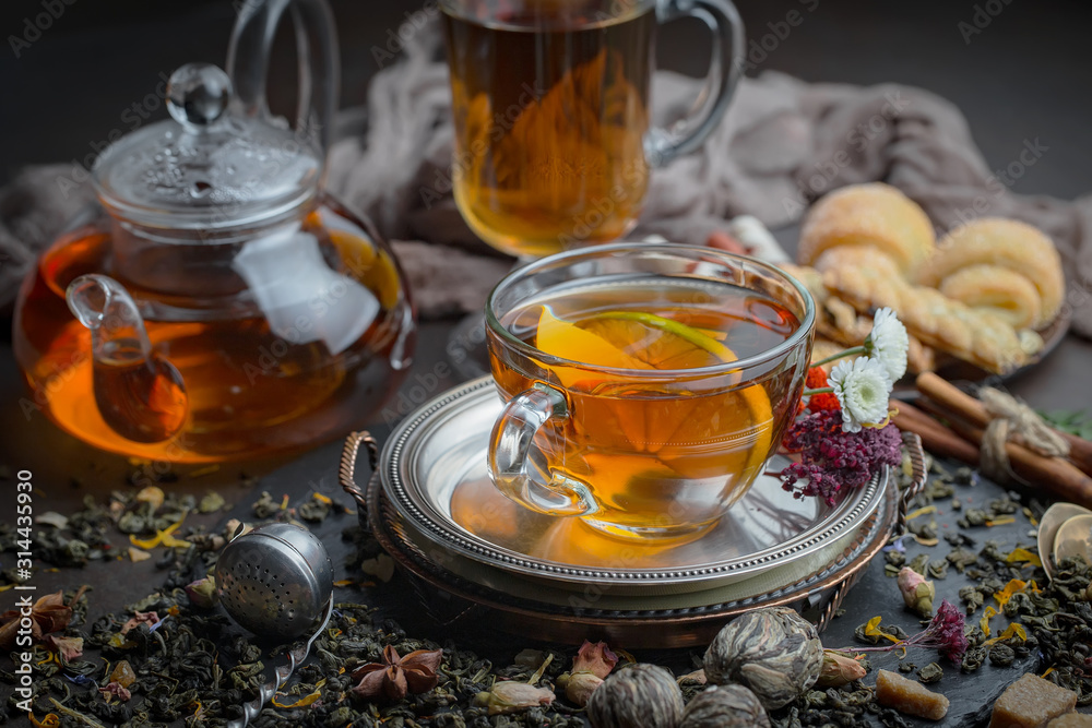 Tea hot drink on old background in composition on the table