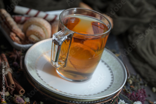 Tea hot drink on old background in composition on the table