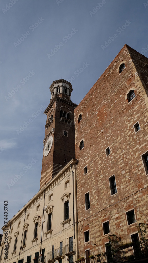Verona, ITALY - April 27, 2019: Torre dei Lamberti, Piazza delle Erbe, Verona, Veneto, Italy.