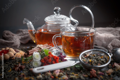 Tea hot drink on old background in composition on the table