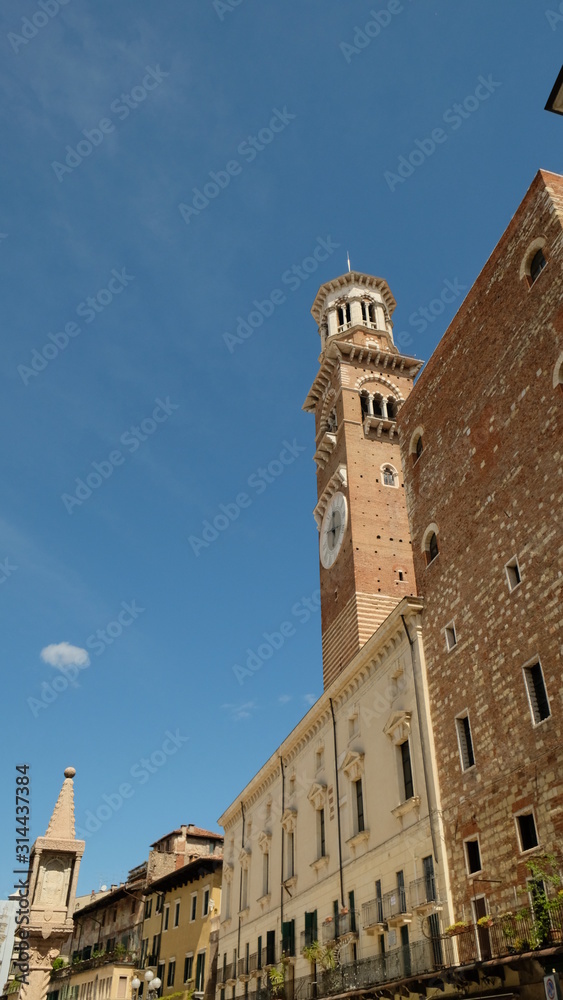 ITALY, Verona - April 28, 2019: Torre dei Lamberti, Piazza delle Erbe, Verona, Veneto, Italy.