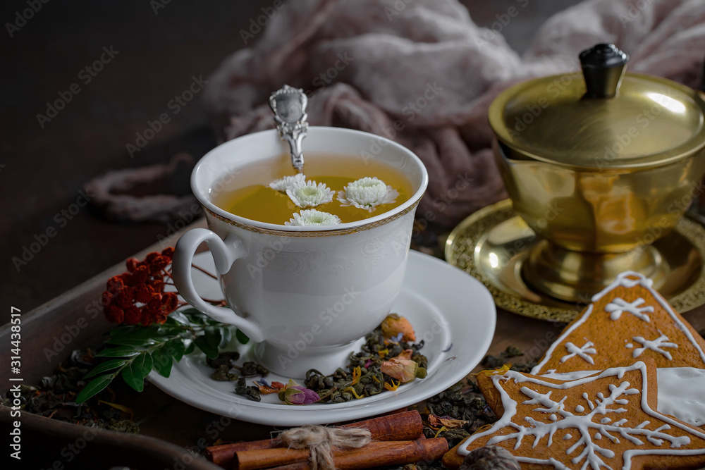 Tea hot drink on old background in composition on the table Tea hot drink on old background in composition on the table