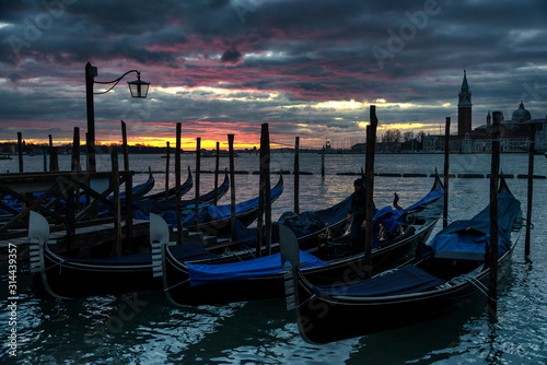 Vibrant sunrise over the lagoon of Venice, Italy with gondolas © Karl Allen Lugmayer