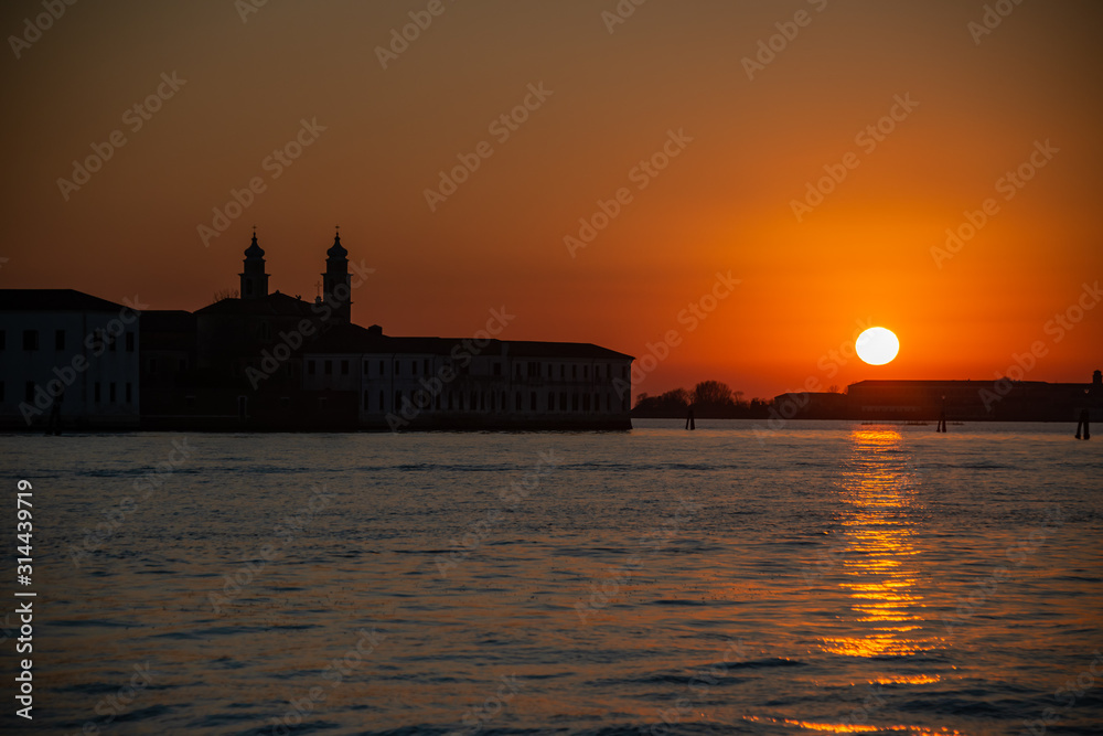Breathtaking winter sunset over the lagoon of venice Breathtaking winter sunset over the lagoon of venice