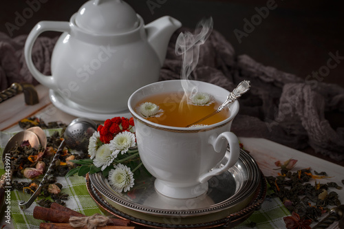 Tea in a cup on an old background