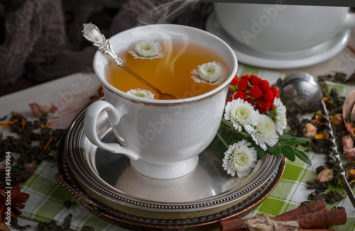 Tea in a cup on an old background