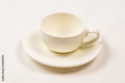 White cup isolated on white background.