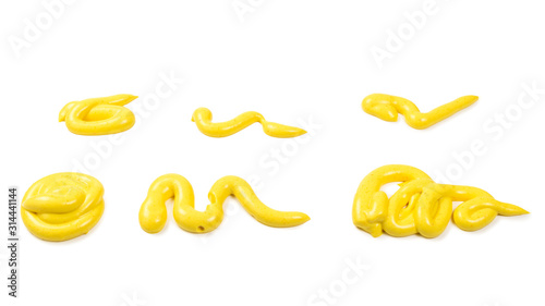Yellow cheese sauce splashes isolated on white background