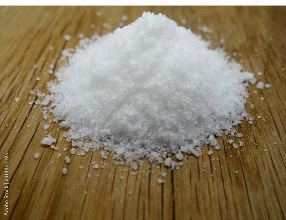 Sea salt on wooden board. Sea salt on wooden board.