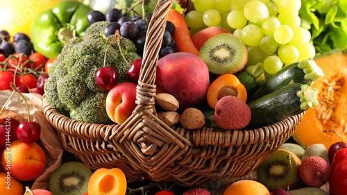 Fototapeta Naklejka Na Ścianę i Meble -  assorted of fruit and vegetable in wicker basket