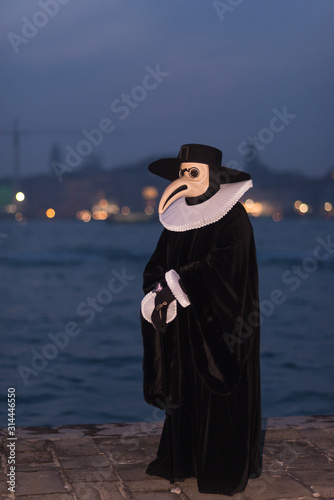Venice, Italy - March 2, 2019: Person dressed as a carnival of Doctor de la Plague.