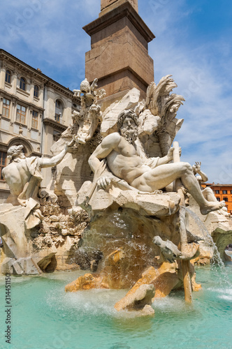 The Fountain of the Four Rivers in the Piazza Navona in Rome, Italy photo