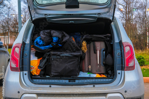 Canvas Print image of a filled open car trunk