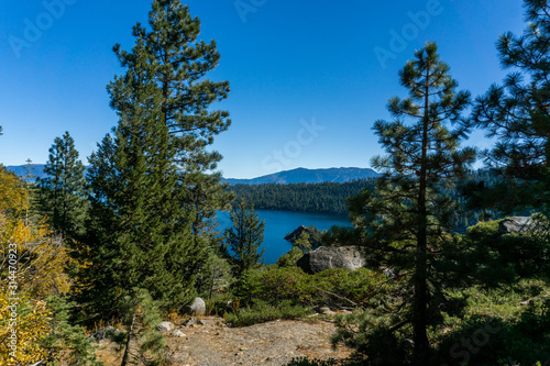 Beautiful view between trees of Emerald Bay in Lake Tahoe, California.