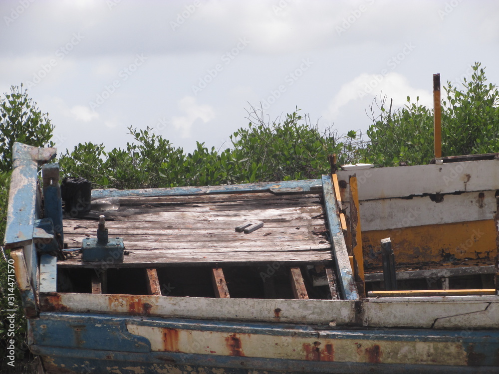 Fototapeta premium old wooden boat on the beach