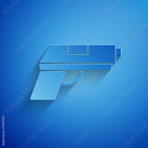 Paper cut Pistol or gun icon isolated on blue background. Police or military handgun. Small firearm. Paper art style. Vector Illustration