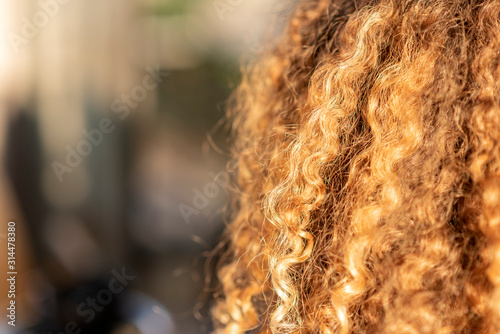 Close up on curly red hair