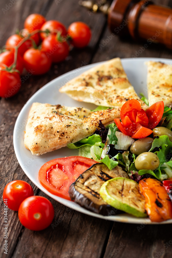Grilled vegetables with cherry tomato decoration Grilled vegetables with cherry tomato decoration