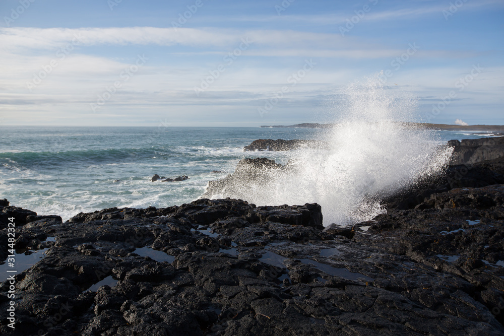 Big waves crashing in rocks on the south west coast on Iceland