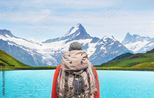 Alpine peaks landskape background. Bachalpsee lake, Grindelwald, Bernese highland. Alps, tourism, journey, hiking concept. photo