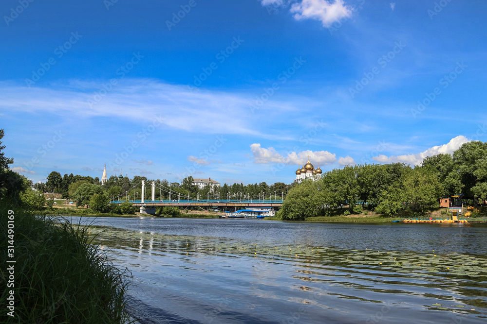 Cable-stayed bridge over the Kotorosl river in Yaroslavl. View from the island of Damansky.