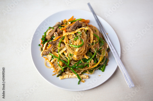Stir fried Korean glass noodle with soy sauce called Japchae