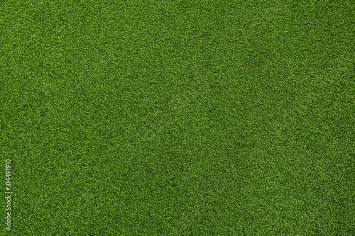 Seamless texture of artificial green grass made of plastic