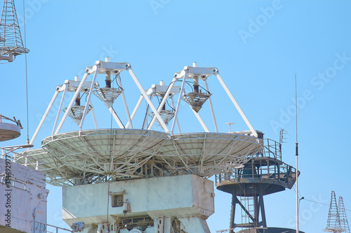 Parabolic antennas of a warship. Radar or radiolocation device. photo