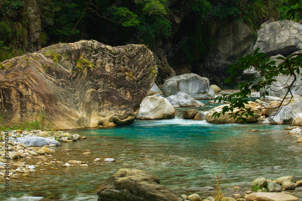 Huge granite on the sand stream of the Taroko Pavilion, Hualien, Taiwan Huge granite on the sand stream of the Taroko Pavilion, Hualien, Taiwan