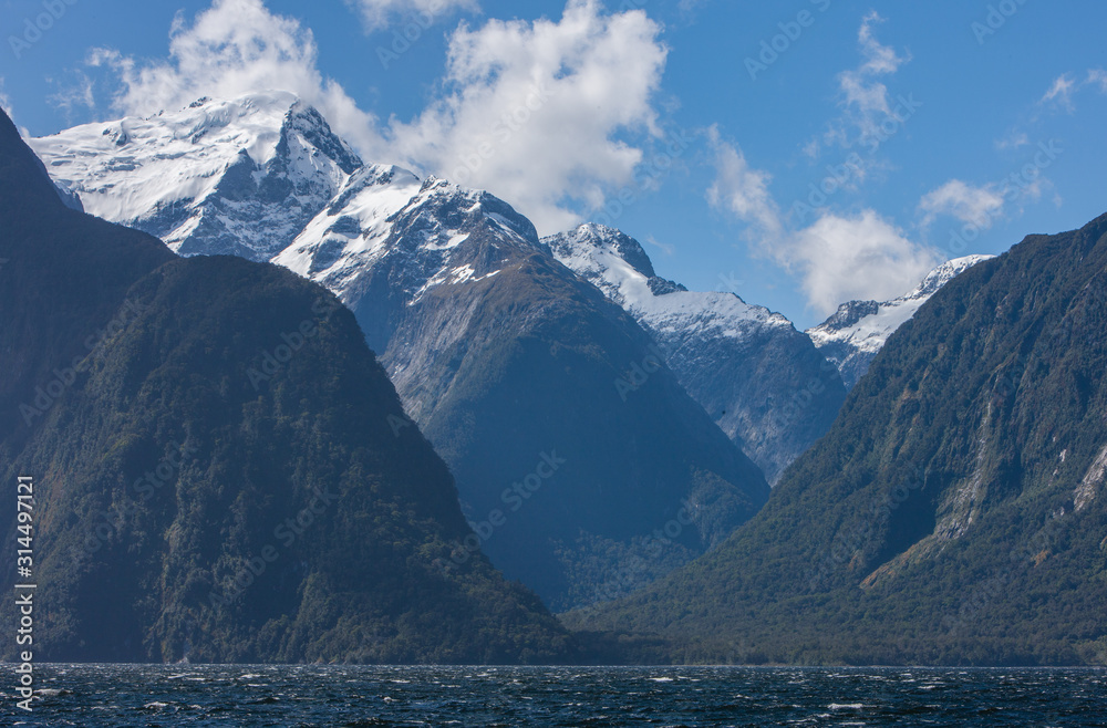 Millford Sound. Fjordland. New Zealand. Mountains snow.