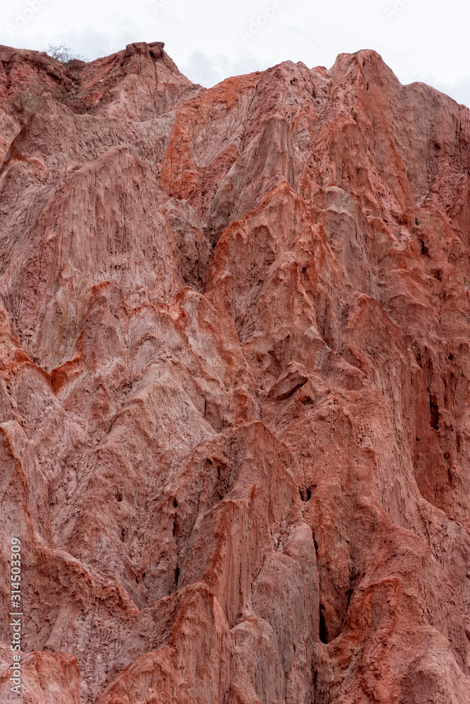 Naklejka premium Landscape of red earth formations in Quebrada de las Conchas, Salta, northern of Argentina