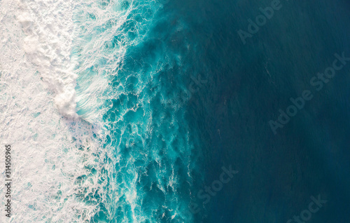 Aerial view to waves in ocean Splashing Waves. photo