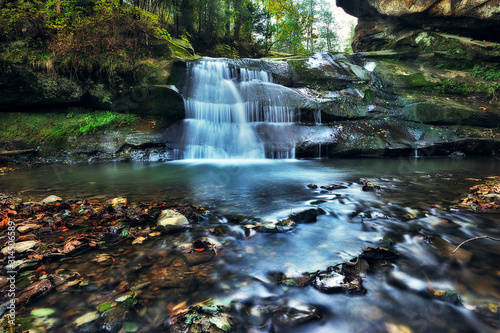 autumn waterfall. picturesque waterfall in the Carpathian mountains