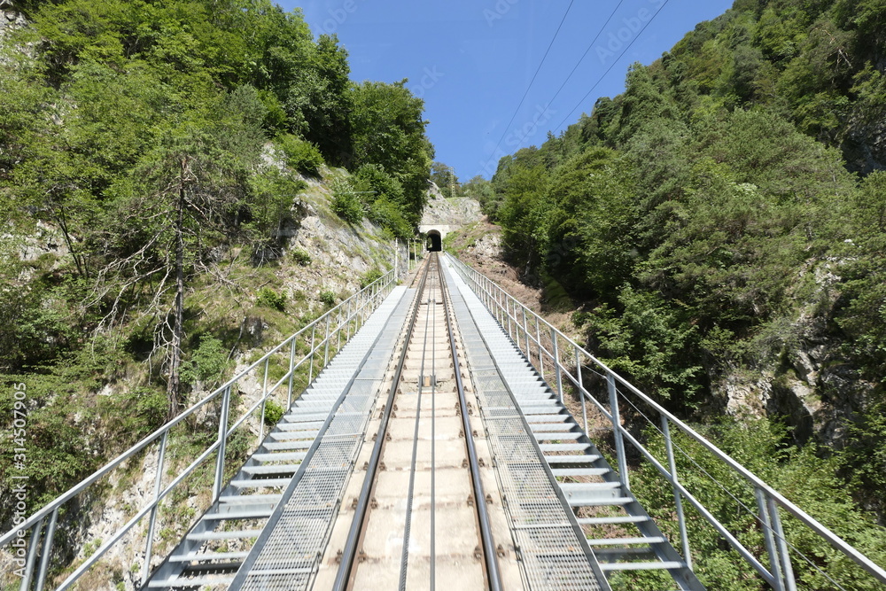 steep rack railway tracks lead up the mountain