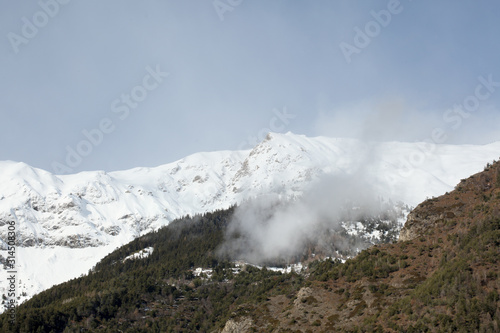 scenic view on a snow covered mountain ridge with copy space for your text