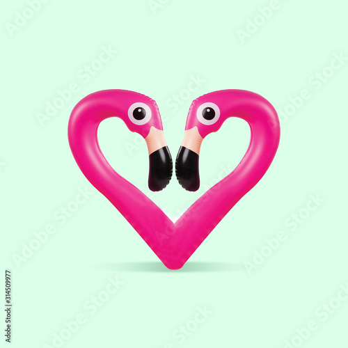 Card for Saint Valentine's Day. Pink flamingo shaped of heart on green background. Copyspace. Modern design. Contemporary colorful and conceptual bright art collage. Romantic, love concept. photo