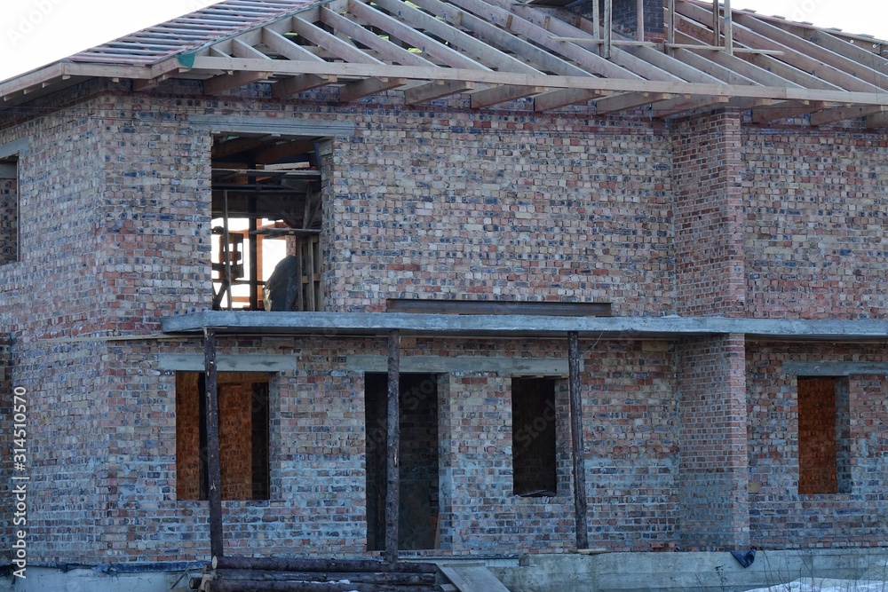 Unfinished brick house in the countryside Unfinished brick house in the countryside