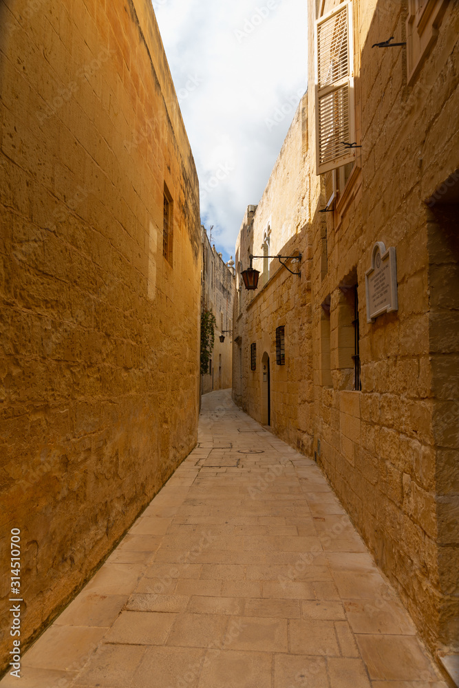 tiny narrow empty street in Mdina
