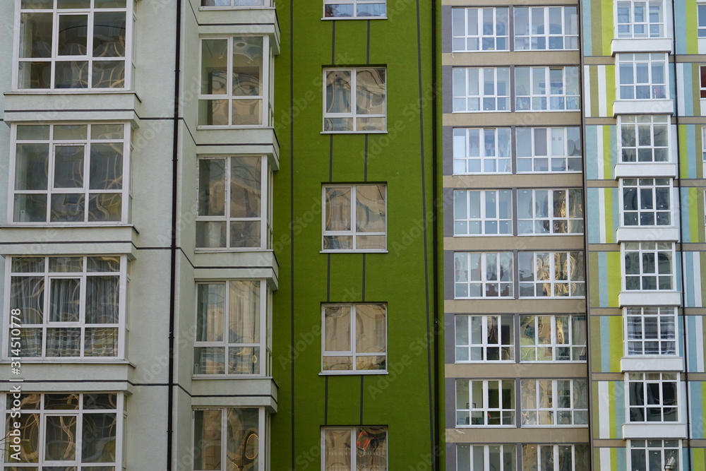 multi-storey modern houses in a residential quarter of the city multi-storey modern houses in a residential quarter of the city