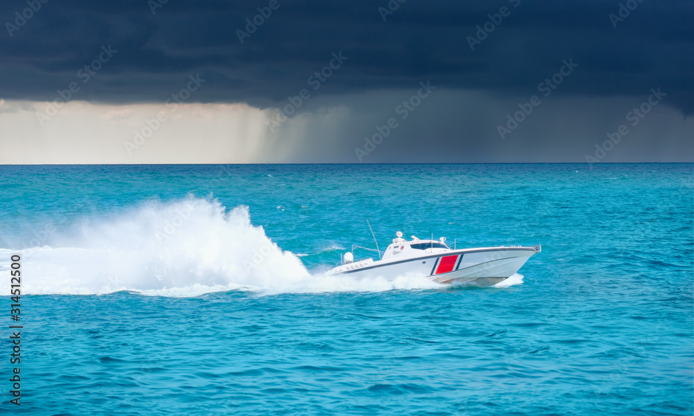 Fototapeta premium Coast Guard patrol boat rushing to the rescue