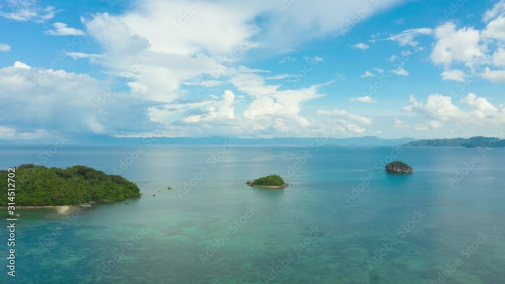 Seascape with tropical islands and coral reefs, aerial view, hyperlapse. Caramoan Islands, Philippines. Summer and travel vacation concept. Seascape with tropical islands and coral reefs, aerial view, hyperlapse. Caramoan Islands, Philippines. Summer and travel vacation concept.